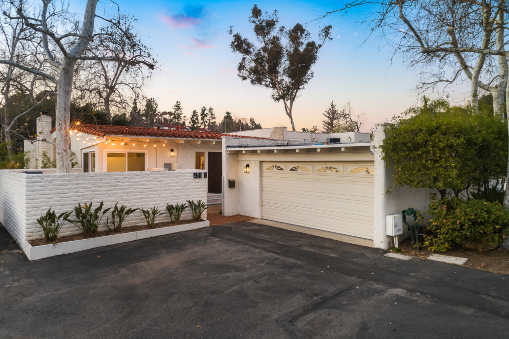 Twilight exterior photography of a Spanish-style home